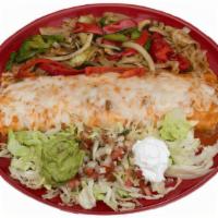 Burrito Fajita De Camarones · Flour tortilla filled with rice, beans and large shrimp that is sautÃ©ed in butter with garl...