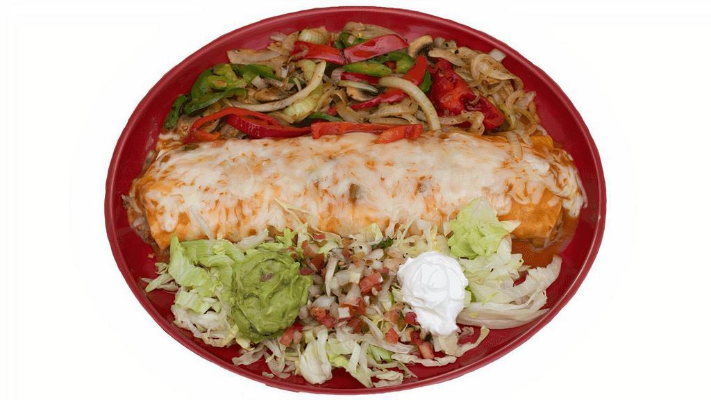 Burrito Fajita De Camarones · Flour tortilla filled with rice, beans and large shrimp that is sautÃ©ed in butter with garlic, onion and red pepper flakes; covered with red sauce and Monterey Jack cheese. Served with bell peppers, onions, sour cream, guacamole and pico de gallo on the side.