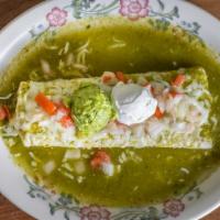 Espresso Burrito · A flour tortilla filled with rice, beans, our choice of meat. Covered with green sauce and m...