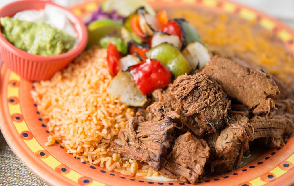 Carne Asada Plate · Beef, pork or chicken with beans, rice tortillas, sour cream, guacamole and salsa fresca.