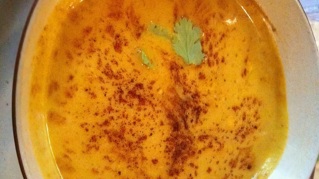 Butternut Squash Soup · Cream homemade butternut squash lightly spiced with clove and cinnamon.