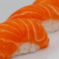 Salmon Nigiri · 4 pieces of Fresh Salmon on white rice*