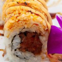Fire Down Below · Spicy tuna roll covered in spicy crab, unagi sauce and spicy yum yum drizzle*