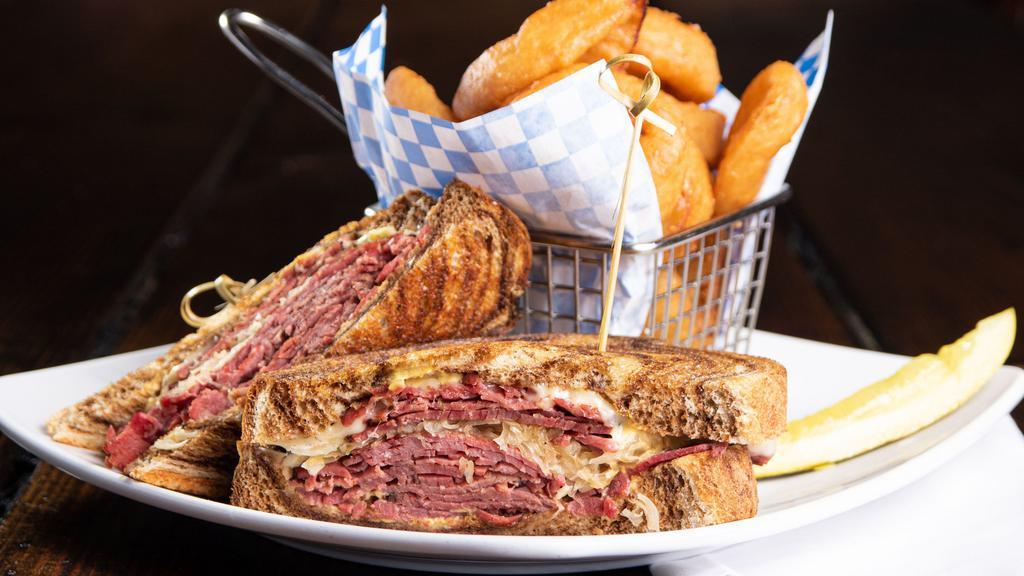 Hot Pastrami Sandwich · Spicy. Warm pastrami and melted Swiss cheese topped with sauerkraut and mustard on marble rye. Served on whole wheat or sourdough bread.