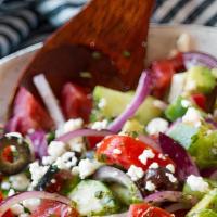 Greek Salad Large · Equivalent to about 4 dinner sized salads. Fresh cut romaine, red onions, tomatoes, green pe...