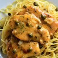 Chicken Picatta · Chicken breast pieces sauteed in white wine, butter, capers, green onions, lemon, and mushro...