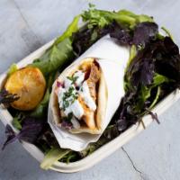 The Chicken Genie Gyro  · Delicately marinated sliced chicken breasts served in hot pita bread. Topped off with tomato...