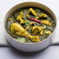 The Chicken Saag Bowl · Green spinach masala cooked with boneless chicken, served with salad and rice.