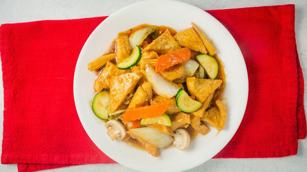 Braised Tofu · Lightly fried tofu stir-fried with assorted vegetables in a brown sauce. A delicious tofu dish.