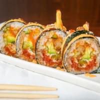 Rock Star Roll · Green chili tempura, shrimp tempura, cucumber, avocado, crab, and spicy tuna inside with spi...