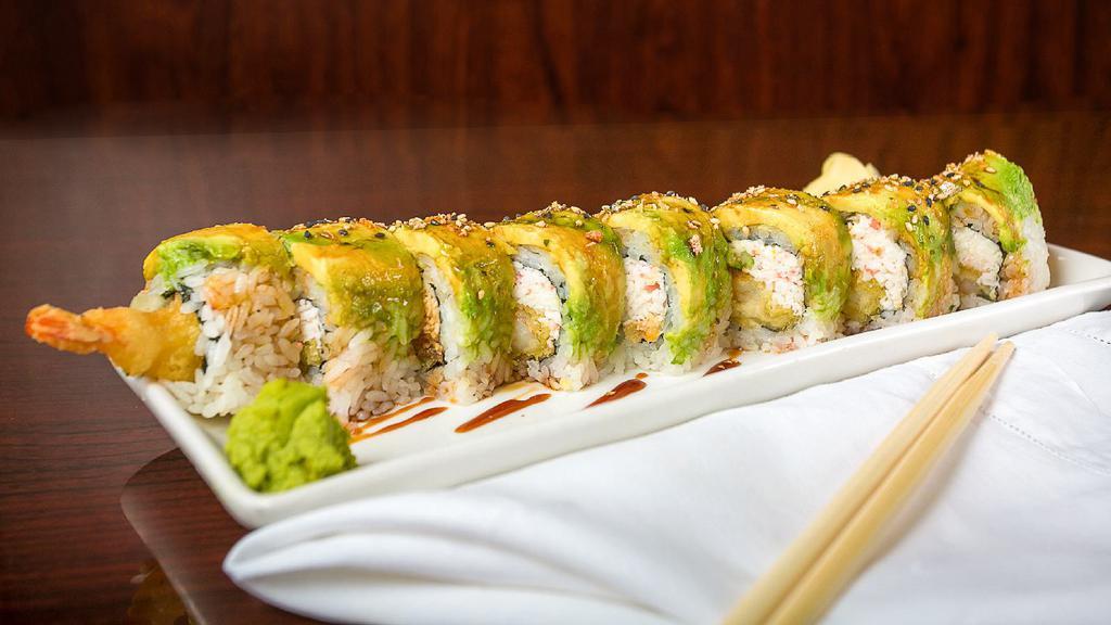 Green Dragon Roll · 2 shrimp tempura, cucumber, avocado, and crab inside with avocado, eel sauce, and Salmon crunch , on top.