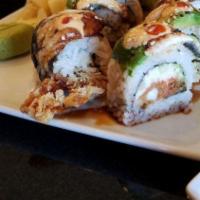 Godzilla Roll · Cucumber, avocado, soft shell crab, and spicy tuna inside with eel, eel sauce, and spicy may...
