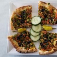 Veggie Pie · Flat dough topped with diced onions, diced green pepper, diced black olives and diced tomato...