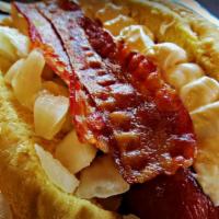 The Baconese Dog · With bacon & cheddar cheese.