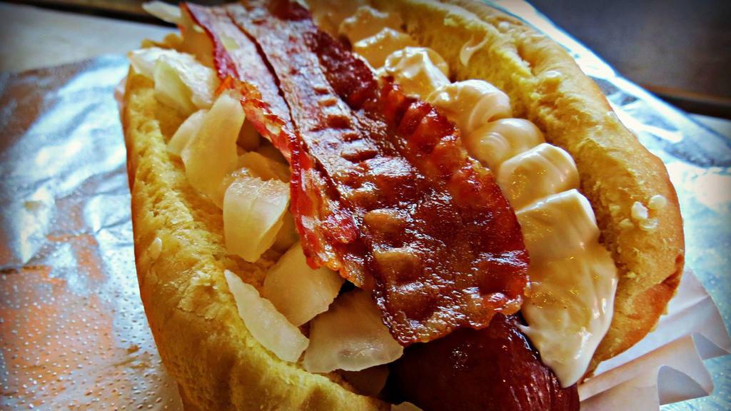 The Baconese Dog · With bacon & cheddar cheese.