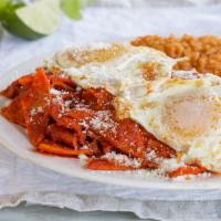 Chilaquiles · Red or Green Chilaquiles topped with grilled onion, queso fresco, and an egg. Served with Ri...