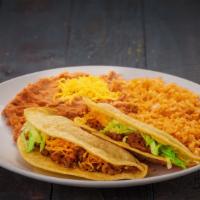 Two Beef Tacos · Two shredded beef tacos. Served with rice and beans.