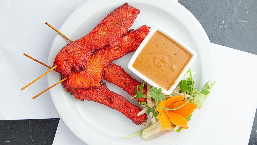 Chicken Satay (Gluten-Free) · Marinated chicken satay. Served on a stick with our Thai Drift peanut sauce with a side of sticky rice (4 skewers).