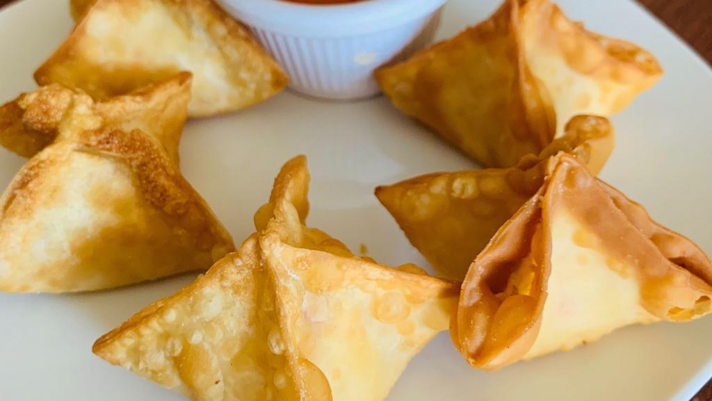Triple C-Wonton · Crabmeat, cream cheese, carrot & onions wrapped in wonton skin. Deep fried to perfection. Served with house sweet sauce(5 pieces)