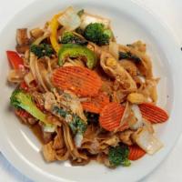 Pad Kee Moaw · Pan fried wide rice noodles, broccoli, bell peppers, onions, mushroom, carrots, baby corn, T...