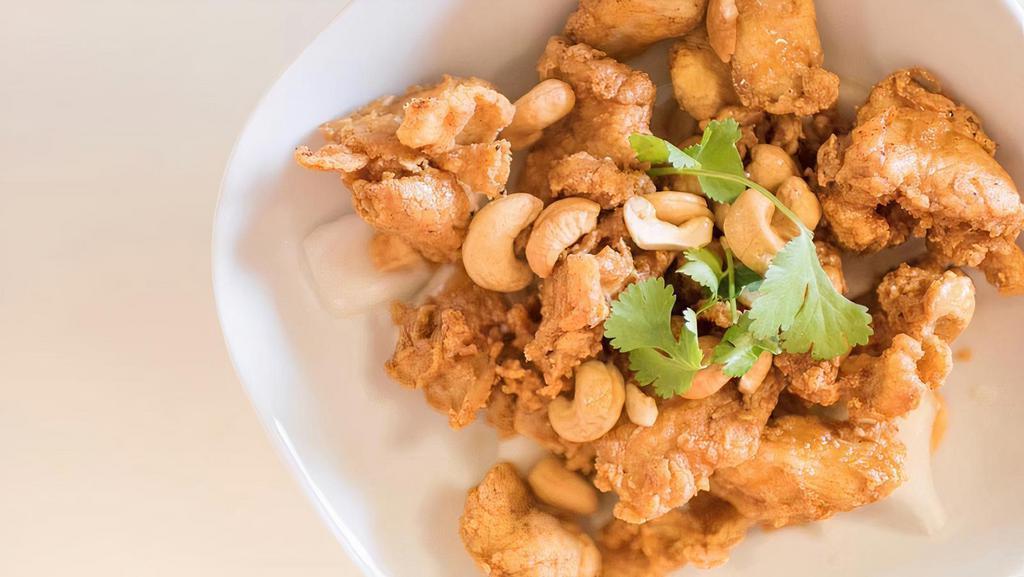 Tamarind Chicken · Battered & fried chicken, cashew, drenched in our original Thai Drift tamarind sauce.
