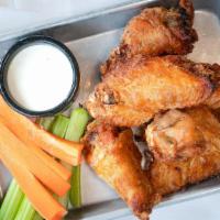Wings · Gluten-free. 1 lb of jumbo wings, smoked in-house & flash fried, carrots with ranch or blue ...