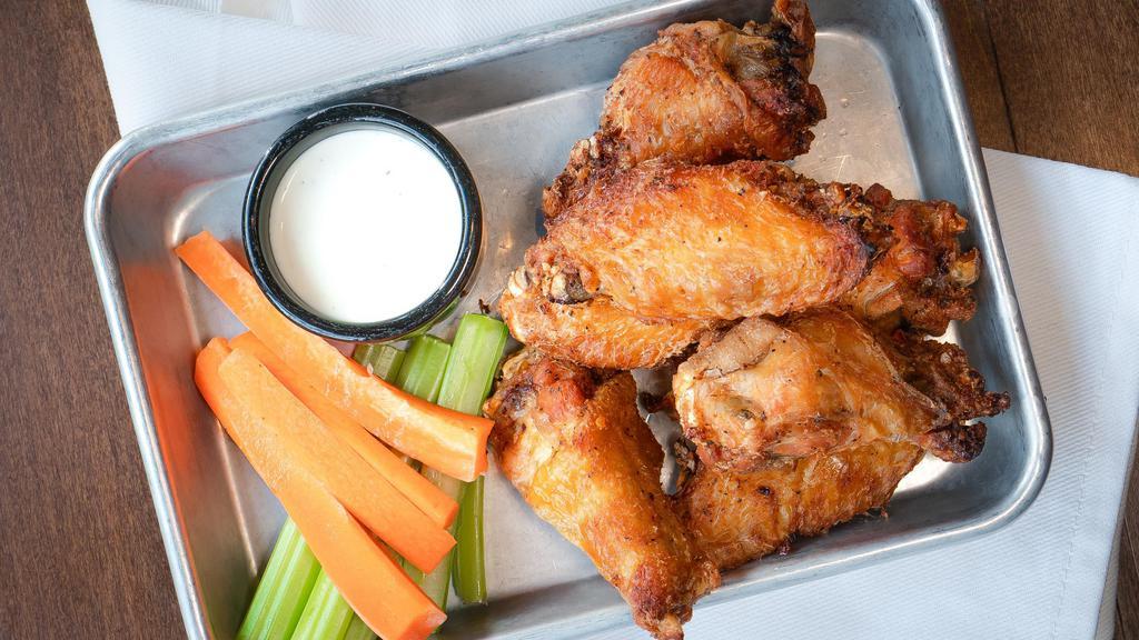 Wings · Gluten-free. 1 lb of jumbo wings, smoked in-house & flash fried, carrots with ranch or blue cheese.