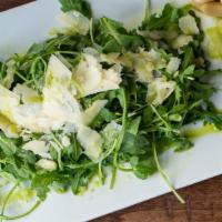 Arugula Salad · Vegan, gluten-free. arugula, shaved parmesan, garlic, olive oil & herbs, lemon.