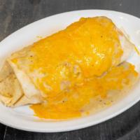 Breakfast Burro · Scrambled eggs, potatoes, refried beans, onions, peppers & cheddar wrapped in a warm tortilla.
