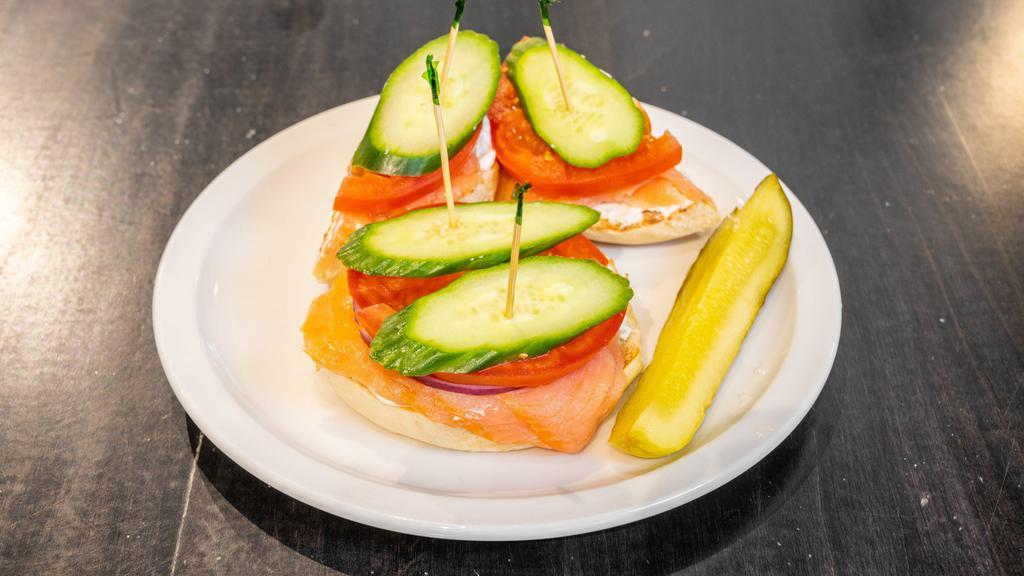 Bagel W/ Lox · with tomato & onion. Capers add .50  Open-face with double the goodies! add 3.99