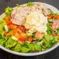 Trio Salad · Scoop of tuna, egg & chicken salad on fresh greens with tomato, onion & cucumber.