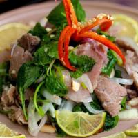 Rare Lime Beef (Gỏi Bò Tái Chanh) · Rare fillet  beef with vegetable and lime sauce,peanut,dry shallot.