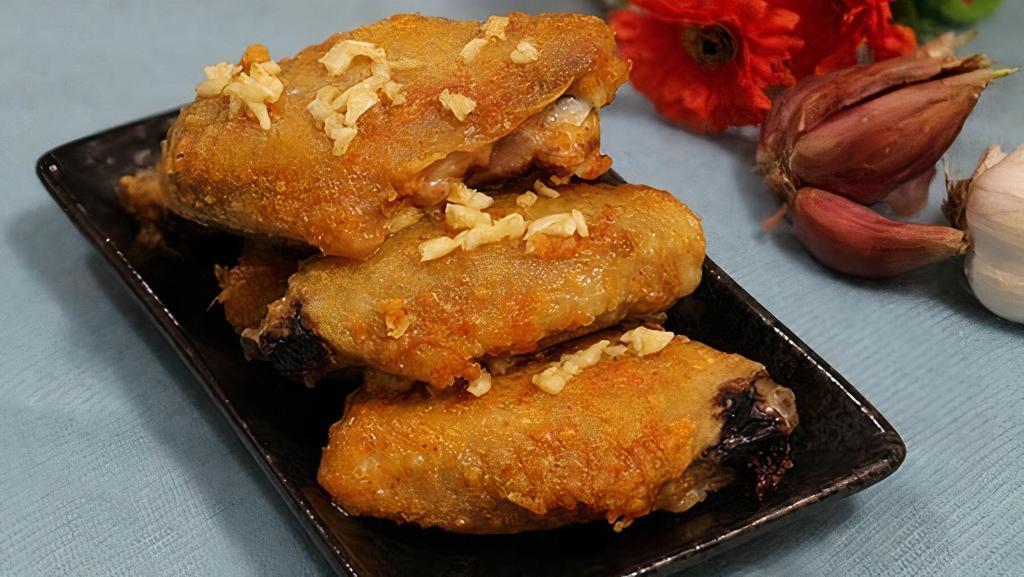 Fried Chicken Wings With Tamerind  Sauce (Cánh Gà Chiên Nước Mắm Me) · 5pcs Chicken wings, garlic, tamerind sauce,onion