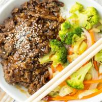 Teriyaki Beef Bowl · Beef and steamed vegetables on top of rice with teriyaki sauce.