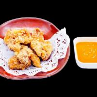 Chicken Karaage · House marinated chicken served deep fried
with a spicy mayo on the side.
