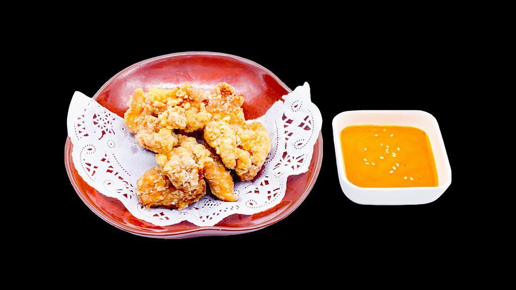 Chicken Karaage · House marinated chicken served deep fried
with a spicy mayo on the side.