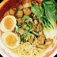 Spicy Tantanmen · Our spin on Sichuan Dan Dan with a kick. Rich chicken and pork base with sesame. Topping com...