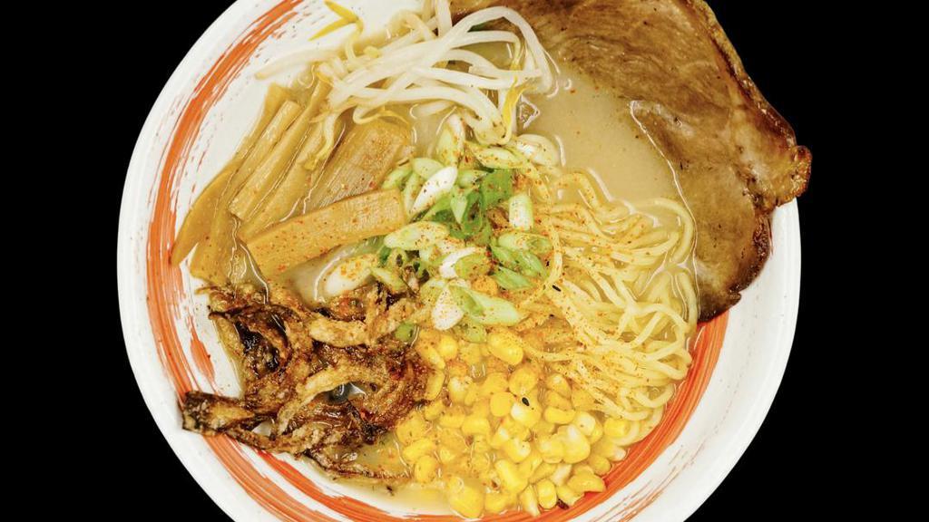 Miso Ramen · Red miso and garlic. Rich pork base. Topping comes with sliced chashu pork, bean sprouts, bamboo shoots, sweet corn, fried onion and green onion.