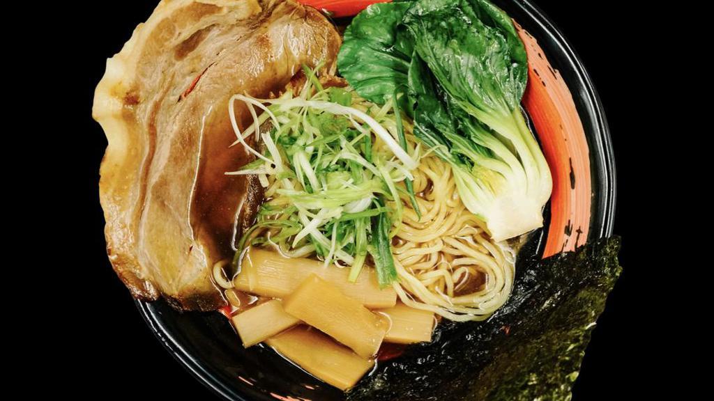 Shoyu Ramen · Mildly sweet soy sauce flavor with clear chicken and pork base. Topping comes with sliced chashu pork, bamboo shoots, yu choy, green onion and roasted seaweed.