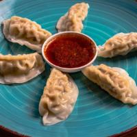 Steamed Dumplings (6 Piece) · Steamed dumplings served with spicy ponzu on the side