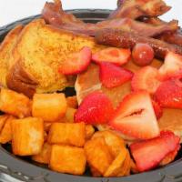 Munch Box Breakfast · French toast or pancakes, eggs, choice of meat and choice of side
