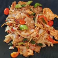 Pad Khee Mao (Drunken Noodle) · Stir fried flat rice noodle, garlic, chili, bamboo, carrot, tomatoes, onion, bell pepper and...