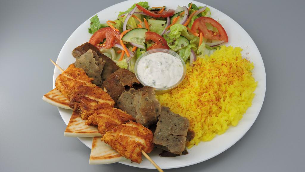 Chicken & Gyro Meat · Includes salad, lemon rice, pita bread, tzatziki, and Greek dressing.