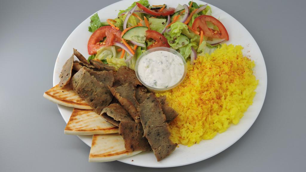 Gyro Meat Plate · Includes salad, lemon rice, pita bread, tzatziki, and Greek dressing.