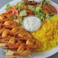 Shrimp Kabob Plate · Includes salad, lemon rice, pita bread, tzatziki, and Greek dressing.