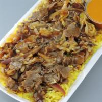 Beef & Rice · Thin slices of sirloin cooked with cabbage, red onion, served over lemon rice with a side of...
