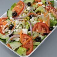 Greek Salad · Lettuce tomato cucumber red onion carrot black olives feta cheese and greek dressing.