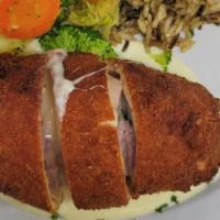 Cordon Blue Veal Fried Potatoes · Breaded, boneless cutlet, sautéed and topped with ham & Swiss cheese and served with fresh v...
