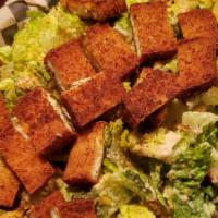 Chix Caesar Salad · large caesar topped with house tofu chix cutlets