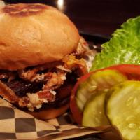 Western Burger · house patty, crispy fried onions, BBQ sauce, thrilling foods bakon, burger sauce. lettuce, t...